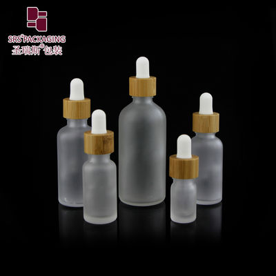 comprar Custom Frosted Essential Oil Empty Packaging 15ml 30ml 50ml 100ml Bamboo Dropper Bottle Fabricação em linha